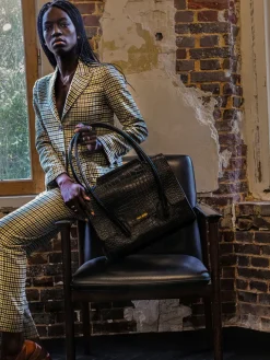 Colette M Alligator